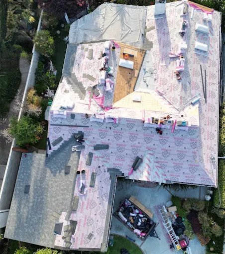 Aerial view of a re-roof in progress